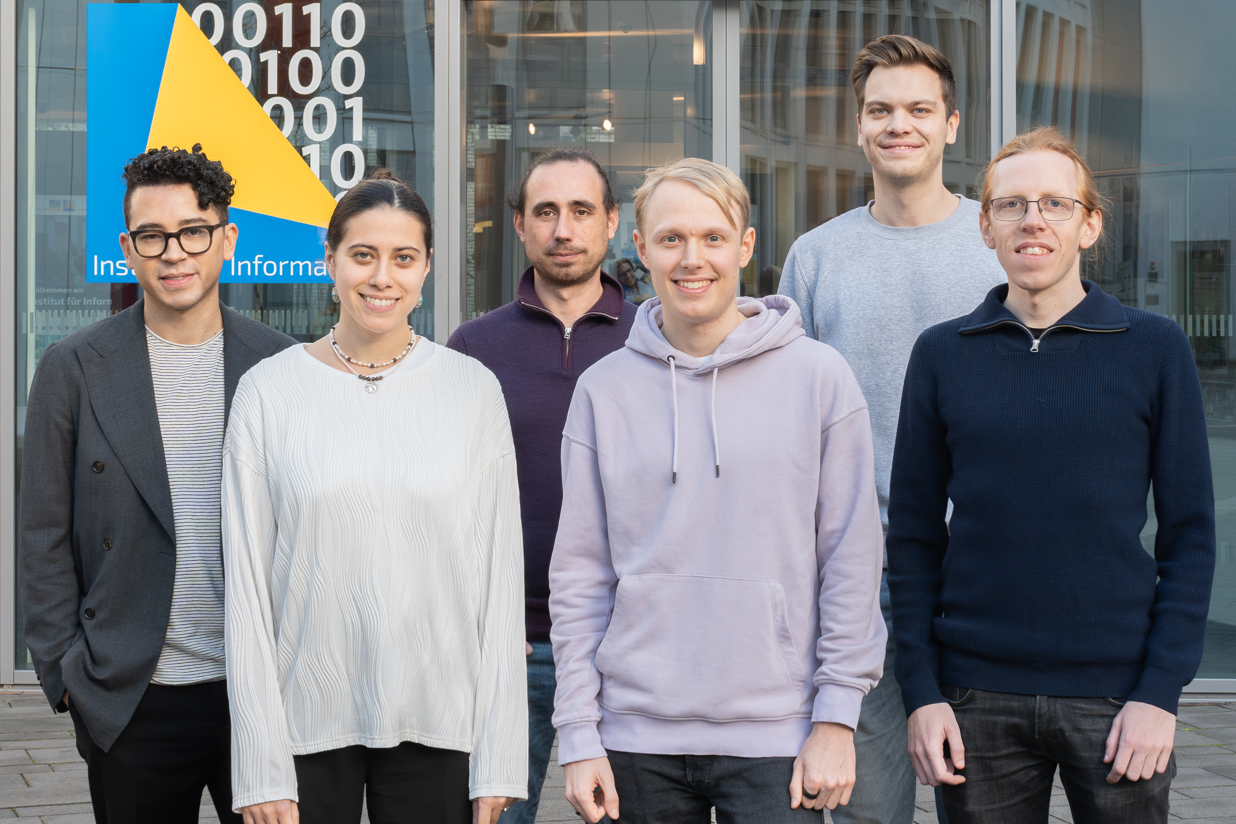 A photo of the DL4SD group in front of the b-it building in Bonn